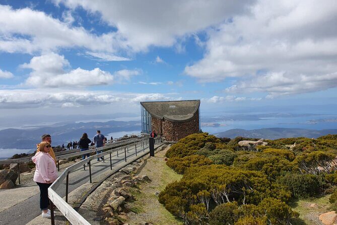 Mount Wellington Pinnacle 2 Hours Small Group Tour - Reaching the trig point and making time for photos
